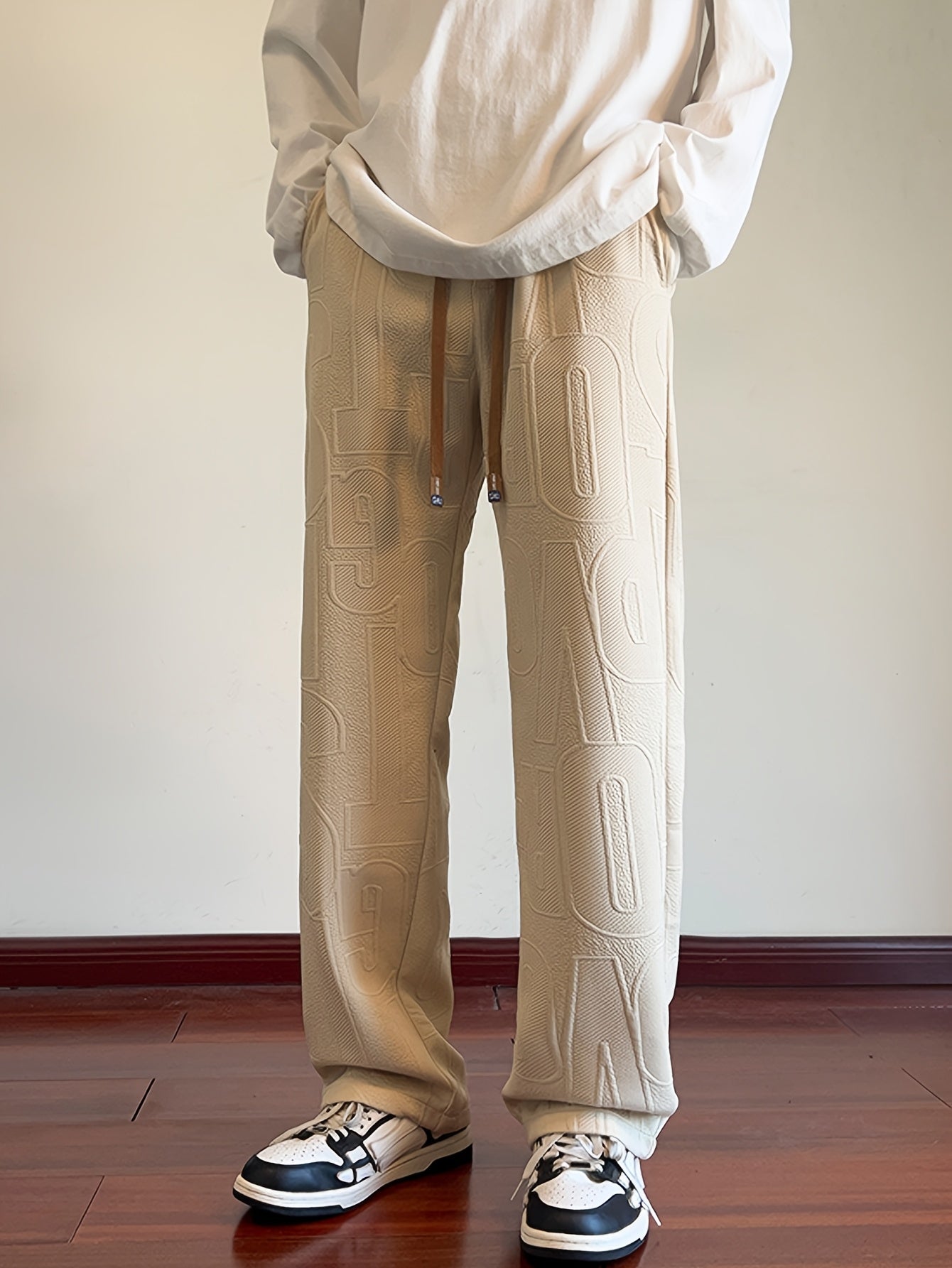 Calças de corte direito para homem para o outono, em tecido jacquard, com cós elástico e cordão, ideais para uso casual ao ar livre na primavera e no outono.