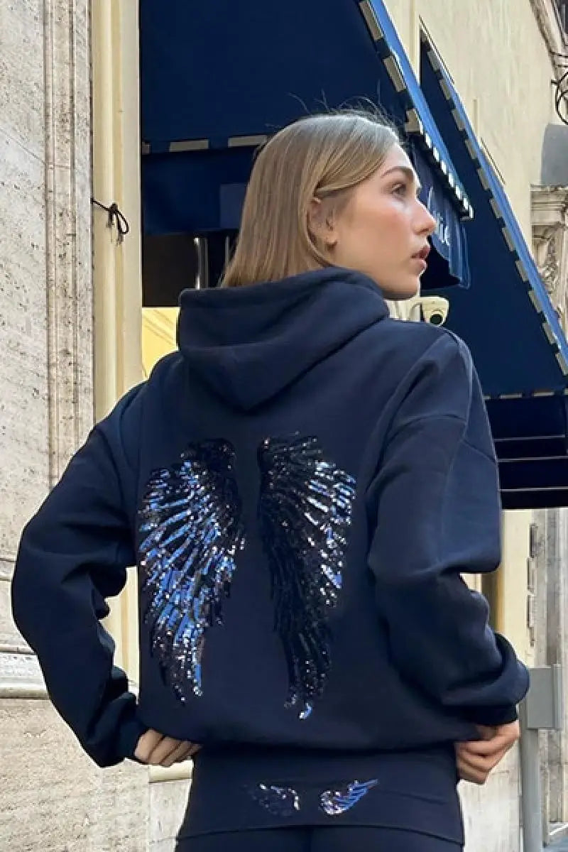 Conjunto de mulher com sweatshirt com capuz e calças compridas, modelo Free Wing, de cor lisa, novidade da moda streetwear casual 2026.