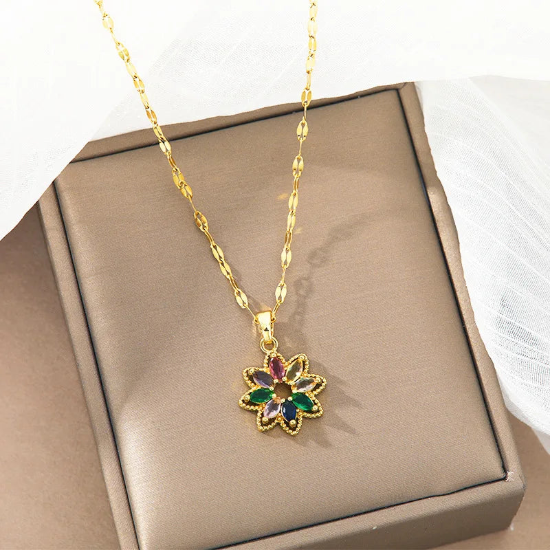 ZAKOL Nouveau Collier Pendentif Fleur Cristal Zircon Arc-en-ciel 7 Couleurs Tendance pour Femmes, Accessoires de Collier Chaîne en Acier Inoxydable