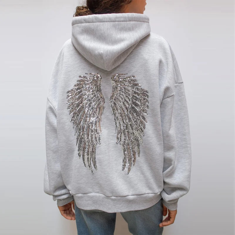Conjunto de mulher com sweatshirt com capuz e calças compridas, modelo Free Wing, de cor lisa, novidade da moda streetwear casual 2026.