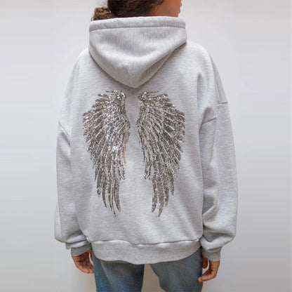 Ensemble sweat-shirt à capuche Free Wing pour femme, haut uni et pantalon long, collection 2026, style streetwear décontracté et unique.