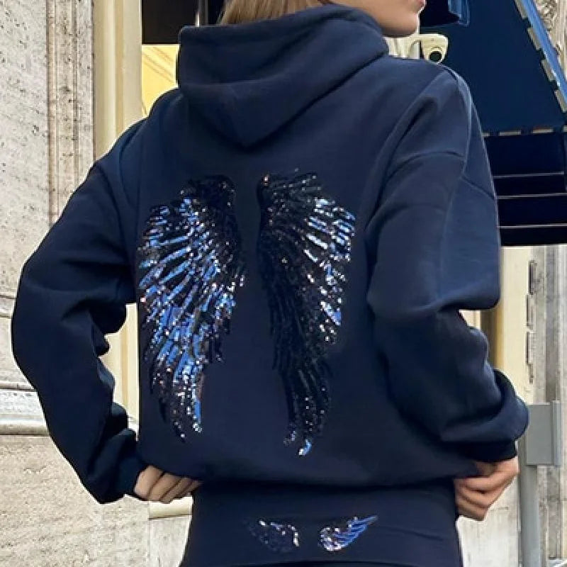 Conjunto de mulher com sweatshirt com capuz e calças compridas, modelo Free Wing, de cor lisa, novidade da moda streetwear casual 2026.